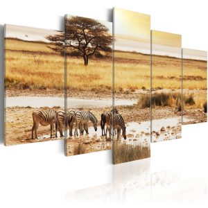 ARTGEIST Zebras on a savannah - Bild p&aring; zebror p&aring; savannen tryckt p&aring; duk - Flera storlekar 100x50 - Artgeist